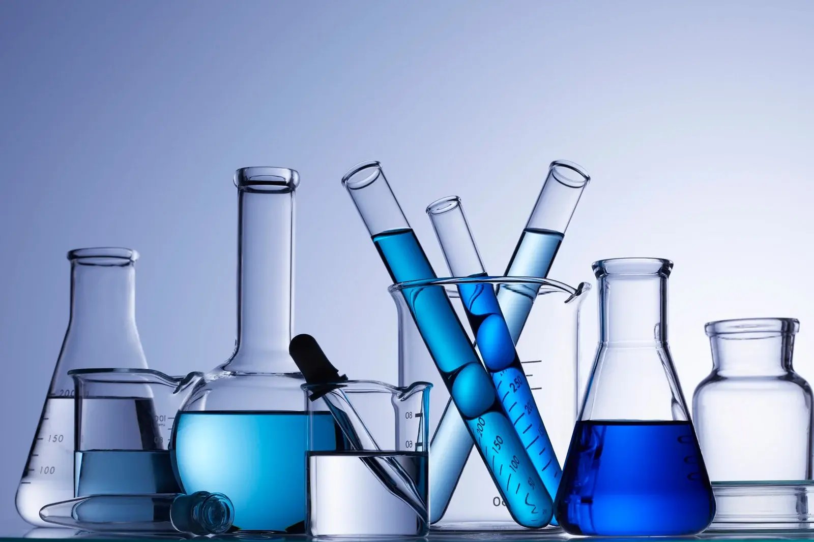 scientific-glassware-with-blue-liquids